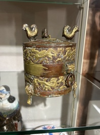A Chinese parcel-gilt copper tripod 'zun' archaic vessel, probably 17th/18th C.