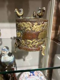A Chinese parcel-gilt copper tripod 'zun' archaic vessel, probably 17th/18th C.