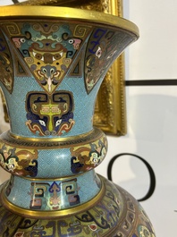 A pair of Chinese cloisonn&eacute; 'taotie masks' vases, 20th C.