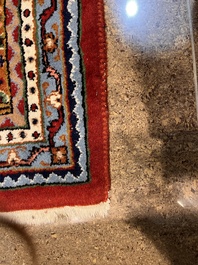 A Persian Bidjar rug with floral design, wool on cotton, 20th C.