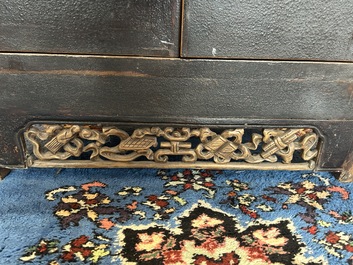 A Chinese wooden altar cabinet ('jia tang gui') with openworked ends, Guangdong/Fujian, late Qing/Republic