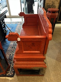 A Chinese five-piece red lacquer throne ensemble with dragons in imperial Qianlong style, 20th C.