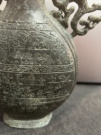 A Chinese bronze 'bianhu' vase and a 'zhong' bell, possibly Han and Western Zhou Dynasty
