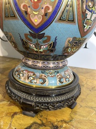 A pair of Chinese cloisonn&eacute; 'taotie masks' vases, 20th C.