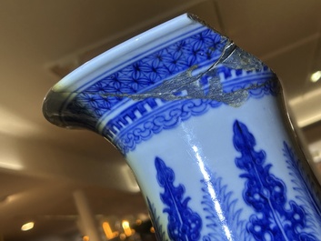 A pair of Chinese famille rose vases and a tall blue and white vase, 19th/20th C.