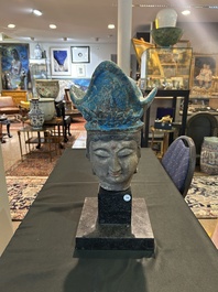 A large Chinese partly turquoise-glazed pottery head of Guanyin in Ming style, probably 19th C.