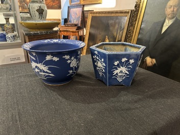 A Chinese white-slip-decorated blue-ground garden seat and two jardini&egrave;res, 19th C.