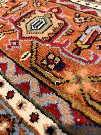 A Persian Bidjar rug with floral design, wool on cotton, 20th C.