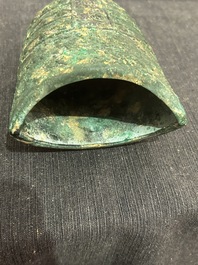 A Chinese bronze 'bianhu' vase and a 'zhong' bell, possibly Han and Western Zhou Dynasty