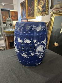 A Chinese white-slip-decorated blue-ground garden seat and two jardini&egrave;res, 19th C.