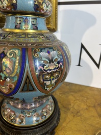 A pair of Chinese cloisonn&eacute; 'taotie masks' vases, 20th C.
