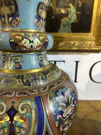 A pair of Chinese cloisonn&eacute; 'taotie masks' vases, 20th C.