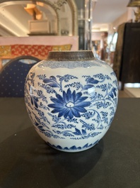 A Chinese blue and white jar with reticulated wooden cover, Kangxi
