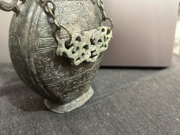 A Chinese bronze 'bianhu' vase and a 'zhong' bell, possibly Han and Western Zhou Dynasty