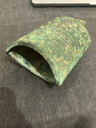 A Chinese bronze 'bianhu' vase and a 'zhong' bell, possibly Han and Western Zhou Dynasty