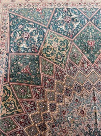 A Persian Tabriz rug with floral design, wool on cotton, first half 20th C.