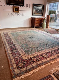 A Persian Tabriz rug with floral design, wool on cotton, first half 20th C.