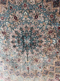 A Persian Tabriz rug with floral design, wool on cotton, first half 20th C.