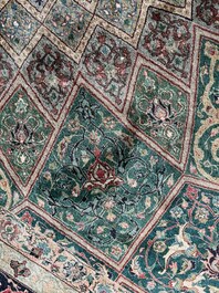 A Persian Tabriz rug with floral design, wool on cotton, first half 20th C.