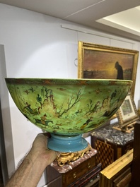 A large turquoise glass bowl painted with battle, hunting and polo scenes, Qajar, Iran, 19th C.