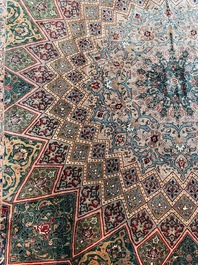 A Persian Tabriz rug with floral design, wool on cotton, first half 20th C.