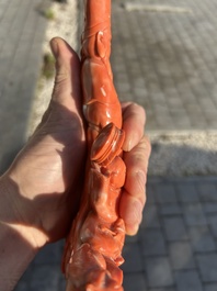 A Chinese red coral group with a scholar, his servant and a monkey, two-character mark, 19th C.