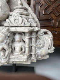 A fine Indian white marble parikha fragment with a Jain Thirthankara, probably Gujarat, 15th/16th C.