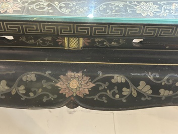 A Chinese rectangular lacquered wooden table with three cloisonn&eacute; plaques, 20th C.