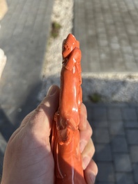 A Chinese red coral group with a scholar, his servant and a monkey, two-character mark, 19th C.