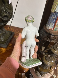 A polychrome Brussels faience allegorical sculpture depicting one of the four seasons, 19th C.