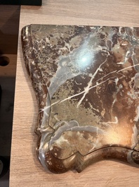 A pair of French carved gilt wooden Louis XV consoles with marble tops, 18th C.