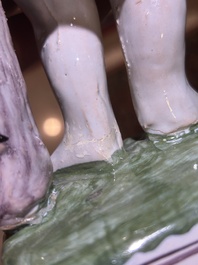 A polychrome Brussels faience allegorical sculpture depicting one of the four seasons, 19th C.