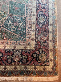 A Persian Tabriz rug with floral design, wool on cotton, first half 20th C.