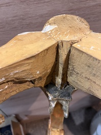 A pair of French carved gilt wooden Louis XV consoles with marble tops, 18th C.