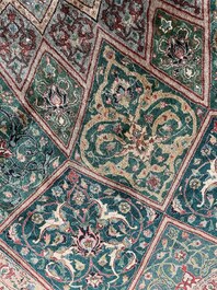 A Persian Tabriz rug with floral design, wool on cotton, first half 20th C.