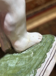 A polychrome Brussels faience allegorical sculpture depicting one of the four seasons, 19th C.