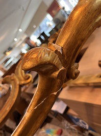 A pair of French carved gilt wooden Louis XV consoles with marble tops, 18th C.