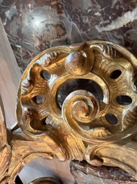 A pair of French carved gilt wooden Louis XV consoles with marble tops, 18th C.