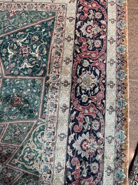 A Persian Tabriz rug with floral design, wool on cotton, first half 20th C.