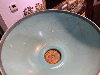 A large turquoise glass bowl painted with battle, hunting and polo scenes, Qajar, Iran, 19th C.