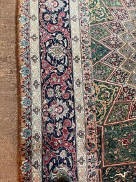 A Persian Tabriz rug with floral design, wool on cotton, first half 20th C.