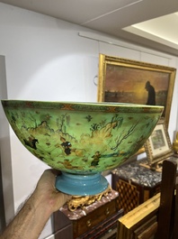 A large turquoise glass bowl painted with battle, hunting and polo scenes, Qajar, Iran, 19th C.