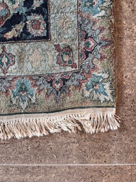 A Persian Tabriz rug with floral design, wool on cotton, first half 20th C.