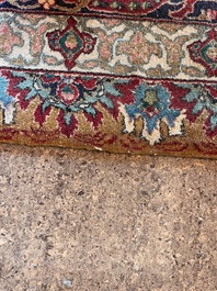 A Persian Tabriz rug with floral design, wool on cotton, first half 20th C.