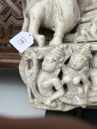 A fine Indian white marble parikha fragment with a Jain Thirthankara, probably Gujarat, 15th/16th C.