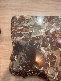 A pair of French carved gilt wooden Louis XV consoles with marble tops, 18th C.