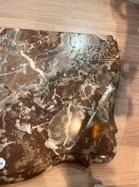 A pair of French carved gilt wooden Louis XV consoles with marble tops, 18th C.