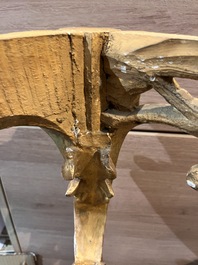 A pair of French carved gilt wooden Louis XV consoles with marble tops, 18th C.