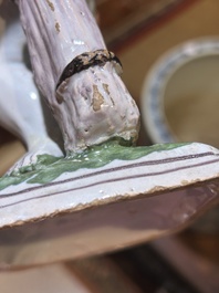 A polychrome Brussels faience allegorical sculpture depicting one of the four seasons, 19th C.