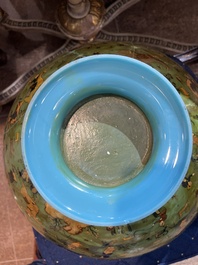 A large turquoise glass bowl painted with battle, hunting and polo scenes, Qajar, Iran, 19th C.